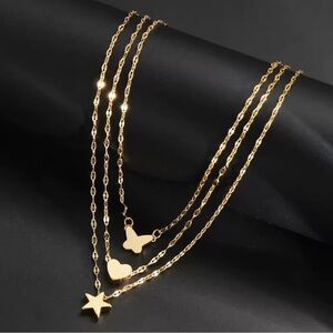 Gold Layered Necklace with Star, Heart, and Butterfly Charms